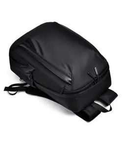 Top view of large capacity business backpack featuring waterproof fabric and zipper details