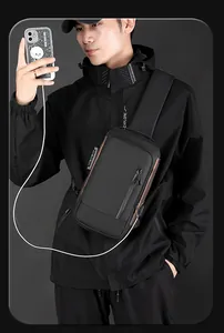 Detail of men's tactical sling bag with anti-theft combination lock and USB charging port
