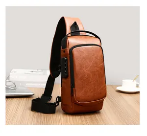 Detailed view of vintage brown leather sling bag with secure anti-theft combination lock
