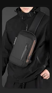 Detail of male chest bag with anti-theft combination lock and external USB charging port