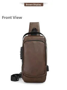 Brown leather sling bag detail with anti-theft combination lock and USB charging port