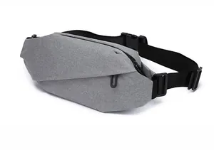 Detailed side view of gray oxford fabric waist bag with reinforced plastic buckle
