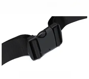 Detail of durable black plastic adjustment buckle and nylon webbing for chest bag strap