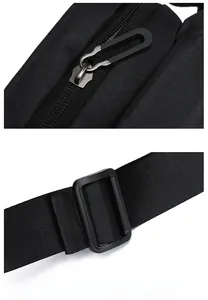Close-up of durable metal zipper with plastic ring and adjustable nylon strap buckle