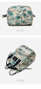 Detailed views of tropical leaf diaper bag with waterproof fabric and bottom structure