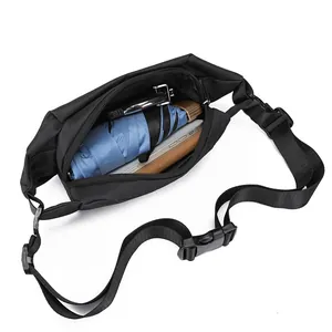 Large capacity black oxford waist bag showing storage for umbrella and power bank