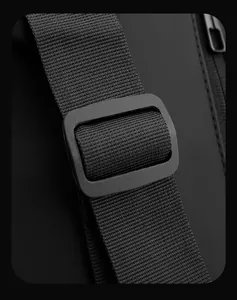 Detailed close-up of matte waterproof fabric with nylon strap and durable plastic buckle