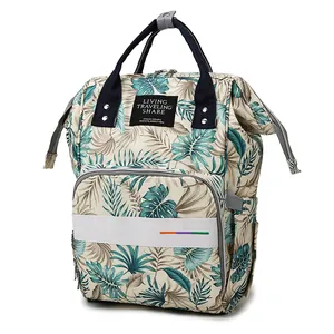 Large capacity waterproof travel diaper backpack with tropical leaf print and top handles