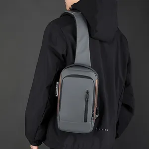 Men's waterproof chest bag with anti-theft lock and USB port in grey and bronze tones