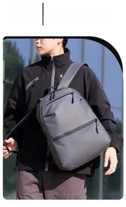Outdoor model display of gray minimalist waterproof commuter backpack with large main pocket