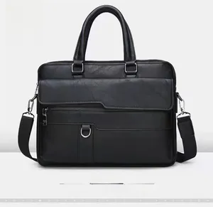 Front view of black leather business briefcase with silver hardware and shoulder strap