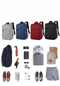 Flat lay επιχειρηματικού σακιδίου με ρούχα και λεπτομέρεια εξωτερικής θύρας φόρτισης USB