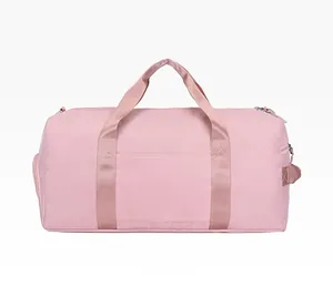 Back view of pink waterproof nylon travel bag showing durable webbing and zipper pocket