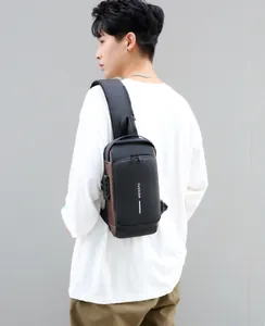 Detail view of anti-theft combination lock and external USB charging port on chest bag
