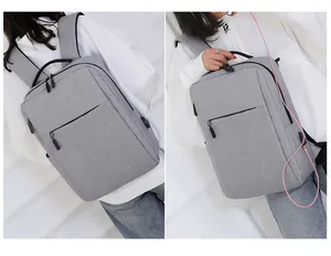 Detailweergave van de grijze zakelijke laptoptas met externe USB-oplaadpoort aansluiting