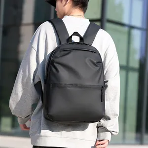Men's large capacity black business laptop backpack with waterproof matte finish for travel