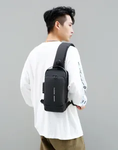 Detail of crossbody bag featuring an anti-theft combination lock and USB charging port
