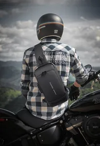 Detail of waterproof nylon chest bag with USB port and lock during outdoor cycling