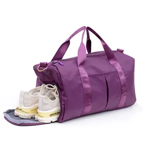 Purple waterproof fitness bag with large capacity and a dedicated shoe compartment