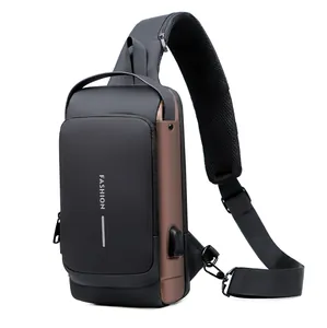 Detail view of the breathable mesh shoulder strap and external USB charging port of the bag