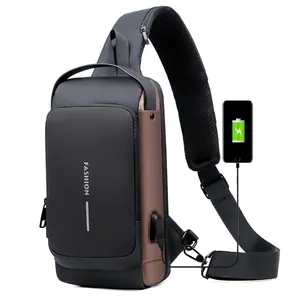 Detail of waterproof crossbody bag showing USB charging port and breathable mesh strap