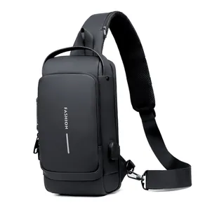 Detail of waterproof crossbody bag featuring a USB charging port and breathable mesh strap