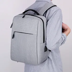 Grijze zakelijke laptoprugzak met USB-poort en ergonomische riemen voor werk en reizen
