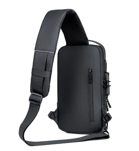 Detail view of anti-theft combination lock and breathable mesh back on black crossbody bag