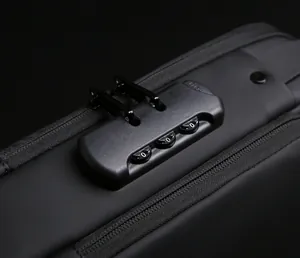 Macro view of the 3-digit combination lock and smooth zipper on the black sling bag