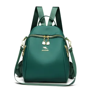 Zaino da donna verde scuro in nylon con logo a canguro dorato e zip a cuore