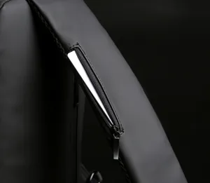Detail of waterproof nylon crossbody bag featuring a hidden shoulder strap card pocket