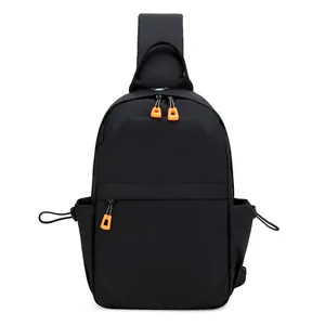 Mens black functional crossbody chest bag with orange zipper pullers and side drawstring pockets
