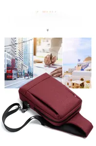 Detail of burgundy oxford chest bag featuring integrated USB charging port and zipper pocket