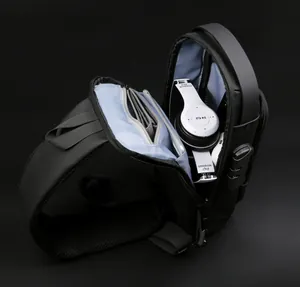 Internal view of nylon sling bag showing spacious compartments and anti-theft lock features