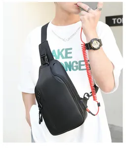 Sac de poitrine noir pour homme avec port de charge USB et compartiments zippés robustes