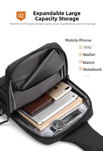 Detail view of the black crossbody bag showing multi-layered internal storage compartments
