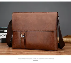 Vue détaillée du sac à bandoulière en cuir grainé marron avec fermoir élégant en forme de H