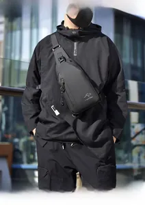 Close-up of matte waterproof chest bag for men with tactical buckle and zipper details