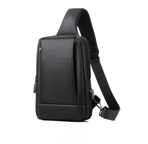 Detail of oxford fabric chest bag showing integrated USB charging port and mesh strap