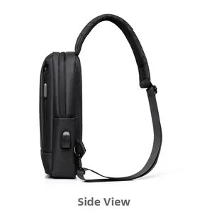 Side view of black oxford fabric sling bag showing USB charging port and padded strap