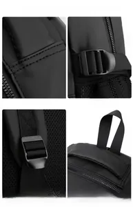 Vue détaillée des poignées renforcées, bretelles en mesh réglables et boucles du sac à dos noir
