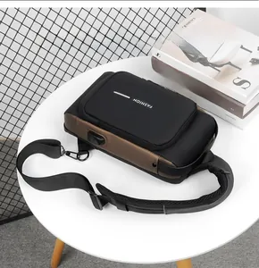 Detail of waterproof chest bag with integrated USB port and breathable mesh strap