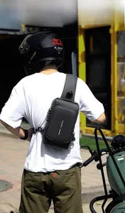 Men's waterproof tactical chest bag featuring anti-theft combination lock and USB port