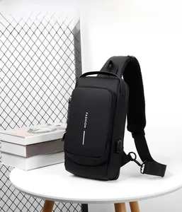 Waterproof black crossbody bag detailing a side USB port and anti-theft combination lock