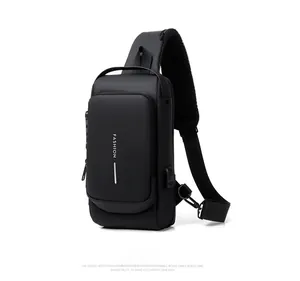 Detail of waterproof black crossbody bag showing USB charging port and texture