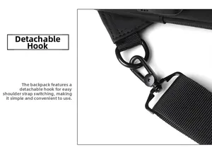 Detail of detachable metal hook and reinforced webbing on black waterproof sling bag