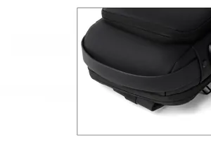 Close-up of durable thickened handle and metallic zipper on black waterproof crossbody bag