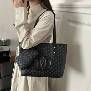 Chic black PU leather tote bag set with M-pattern print and matching small pouch
