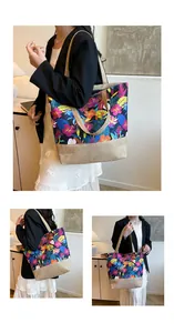Detail of floral canvas tote bag showing tropical print and reinforced bottom panel