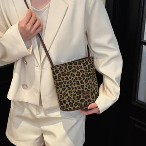 Fashionable leopard print bucket bag for women with leather strap and H-DVI logo detail